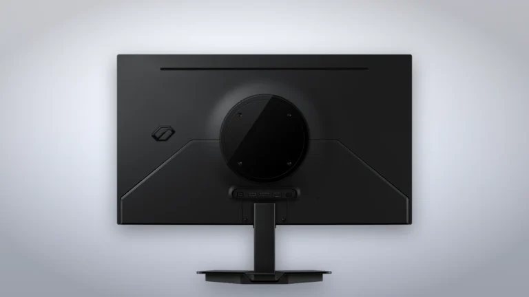 Spatele monitorului Samsung Odyssey OLED G5 G50SF, cu capacul rotund din mijloc și piciorul fix, pe un fundal deschis